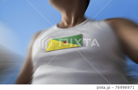 The national flag of French Guiana on the athlete's chest The national flag of French Guiana on the athlete's chest 76996971