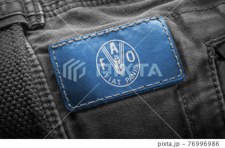 Tag on dark clothing in the form of the flag of the Food and agriculture organization 76996986