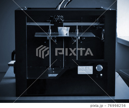 Objects printed by 3d printer. Automatic three dimensional 3d printer performs Objects printed by 3d printer. Automatic three dimensional 3d printer performs 76998256
