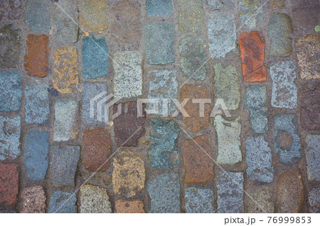 beautiful sidewalk of multicolored stone, medieval cobblestone road beautiful sidewalk of multicolored stone, medieval cobblestone road 76999853