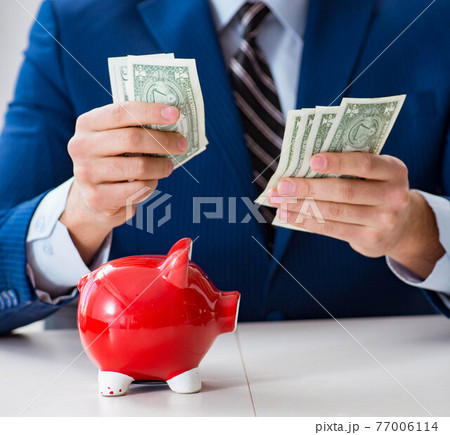 Businessman thinking about his savings during crisis 77006114