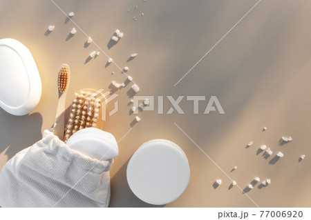 Bath accessories flat lay on beige background. Natural body care concept 77006920