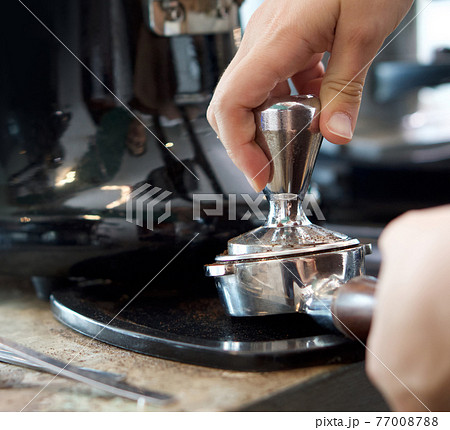 Barista making fresh espresso coffee. Espresso Machine Portafilters (Closeup). Barista making fresh espresso coffee. Espresso Machine Portafilters (Closeup). 77008788