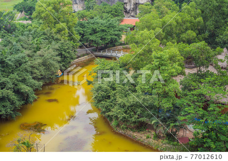 Trang An, Tam Coc, Ninh Binh, Viet nam. It's is UNESCO World Heritage Site, renowned for its boat cave tours. It's Halong Bay on land of Vietnam. Vietnam reopens borders after quarantine Coronovirus Trang An, Tam Coc, Ninh Binh, Viet nam. It's is UNESCO World Heritage Site, renowned for its boat cave tours. It's Halong Bay on land of Vietnam. Vietnam reopens borders after quarantine Coronovirus 77012610