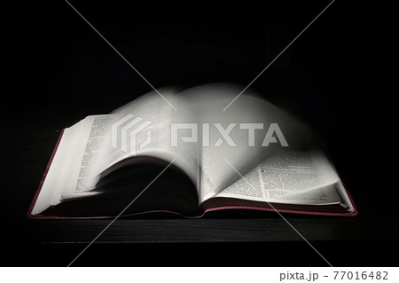 An Open Holy Bible Moving Pages 77016482