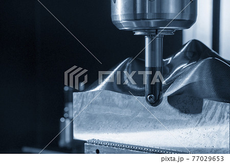 The CNC milling machine rough cutting . 77029653