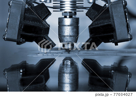 3D printer print isolated objects on mirror reflective surface close-up. 3D printer print isolated objects on mirror reflective surface close-up. 77034027