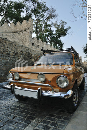 Old car on the street "Old Town" of Baku Old car on the street "Old Town" of Baku 77035284