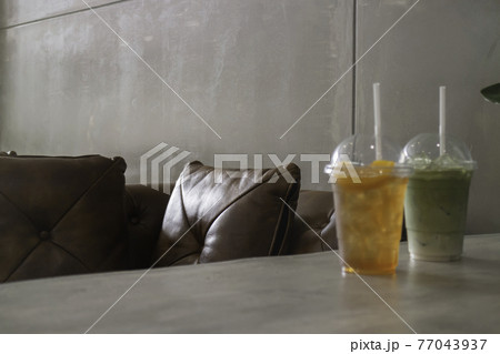 Iced glass of tea drinks 77043937