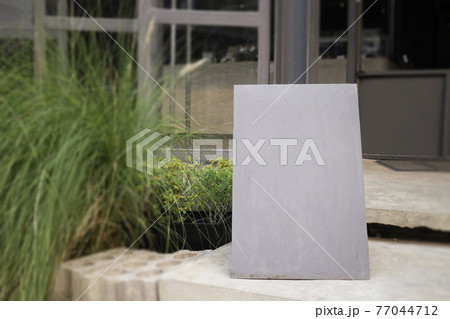 Label board outside at restaurant and coffee shop 77044712