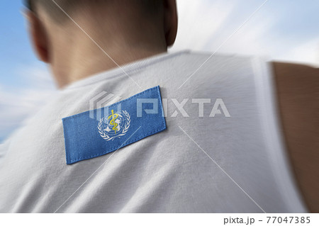 The national flag of World Health Organization WHO on the athlete's back 77047385