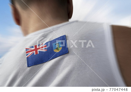 The national flag of Montserrat on the athlete's back 77047448