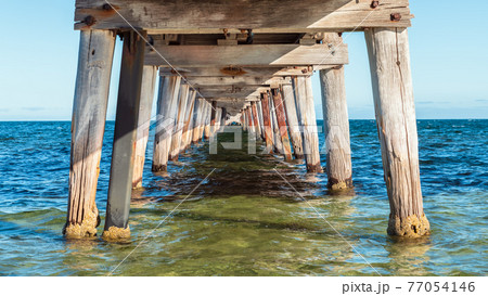 Marion Bay view from under jetty at sunset time Marion Bay view from under jetty at sunset time 77054146