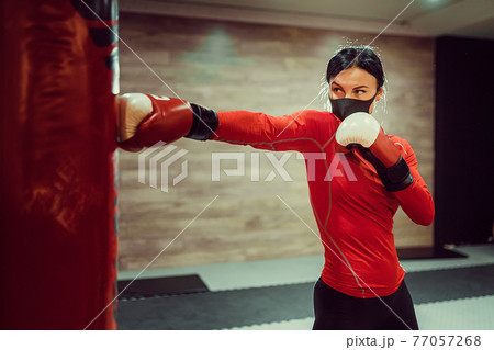 Coronavirus covid-19 prevention, fight. Girl with a medical mask Coronavirus covid-19 prevention, fight. Girl with a medical mask 77057268