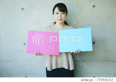 woman with message boards	 77058152