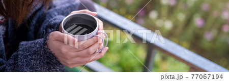 solo woman drink coffee with relax and wellbeing feel with mountain background solo woman drink coffee with relax and wellbeing feel with mountain background 77067194