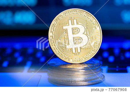 Golden and silver bitcoins on chart. Finance trading 77067908