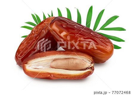 Dates isolated on white background with clipping path and full depth of field. Dates isolated on white background with clipping path and full depth of field. 77072468