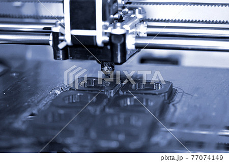 Modern 3D printer printing figure close-up. Automatic three dimensional 77074149