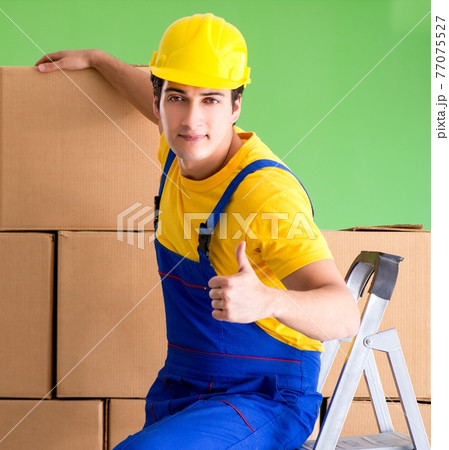 Man contractor working with boxes delivery Man contractor working with boxes delivery 77075527