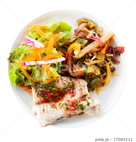 Blue ling fillet with stewed vegetables. French dish Blue ling fillet with stewed vegetables. French dish 77083511