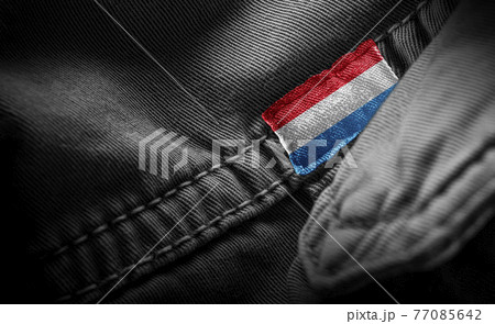 Tag on dark clothing in the form of the flag of the Luxembourg 77085642