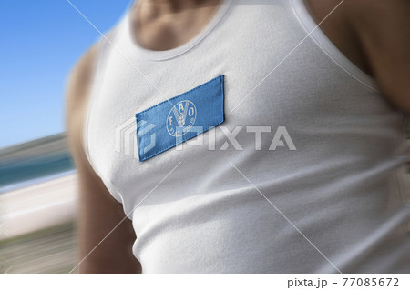 The national flag of Food and agriculture organization on the athlete's chest 77085672