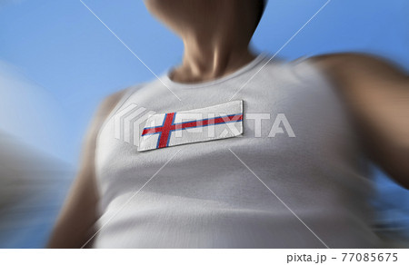 The national flag of Faroe Islands on the athlete's chest 77085675