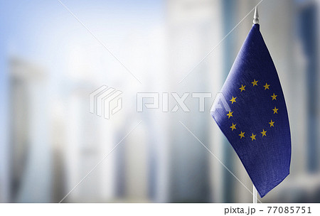 Small national flags of the European Union on a light blurry background Small national flags of the European Union on a light blurry background 77085751