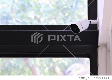 Closed circuit camera or surveillance system for security in office building. 77093153