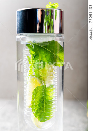 Infused Water with Lime and Mint in special bottle Infused Water with Lime and Mint in special bottle 77095433