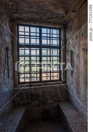 External view of an ancient vintage window of a medieval town in Italy, Europe. External view of an ancient vintage window of a medieval town in Italy, Europe. 77101388