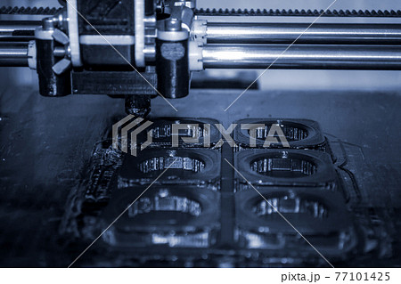 Modern 3D printer printing figure close-up. Automatic three dimensional Modern 3D printer printing figure close-up. Automatic three dimensional 77101425