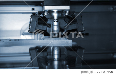 3D printer print isolated objects on mirror reflective surface close-up. 3D printer print isolated objects on mirror reflective surface close-up. 77101450