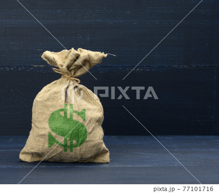 brown full canvas bag with dollar symbol on blue background. Savings, loan and investment concept 77101716