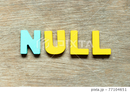 Color alphabet letter in word null on wood background Color alphabet letter in word null on wood background 77104651