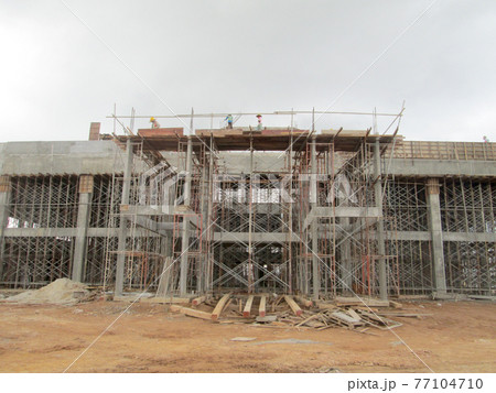 MALACCA, MALAYSIA -AUGUST 22, 2017: Fabrication work of building beam form work and reinforcement bar at the construction site in Malacca, Malaysia. MALACCA, MALAYSIA -AUGUST 22, 2017: Fabrication work of building beam form work and reinforcement bar at the construction site in Malacca, Malaysia. 77104710