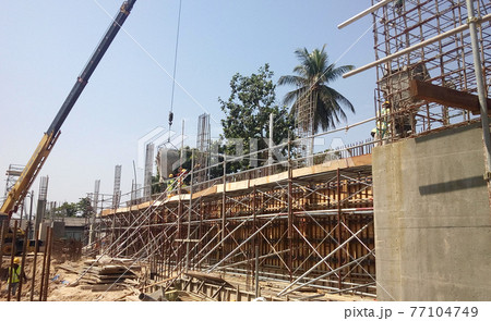 SELANGOR, MALAYSIA -FEBRUARY 20, 2017: Pile of used timber form work at the construction site. It will be demobilize from construction site to recycle or to dispose. SELANGOR, MALAYSIA -FEBRUARY 20, 2017: Pile of used timber form work at the construction site. It will be demobilize from construction site to recycle or to dispose. 77104749