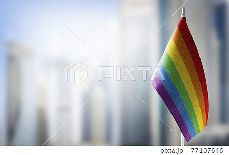 Small national flags of the lgbt on a light blurry background 77107646