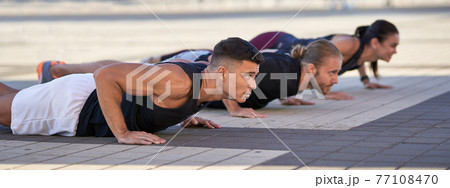 Multiethnic Group Of People Doing Push Ups On Exercise Mat Stock Photo,  Picture and Royalty Free Image. Image 36498029.
