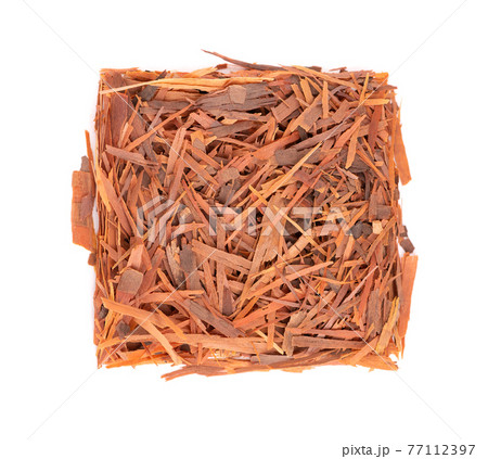 Lapacho herbal tea, isolated on white background. Natural Taheeboo dry tea. Pau d'arco herb. Tabebuia heptophylla. Top view. Lapacho herbal tea, isolated on white background. Natural Taheeboo dry tea. Pau d'arco herb. Tabebuia heptophylla. Top view. 77112397