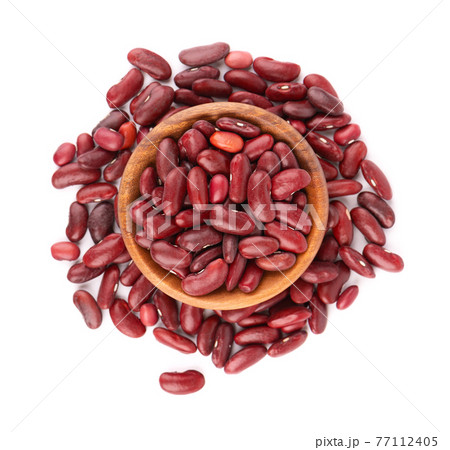 Red kidney beans in wooden bowl, isolated on white background. Rajma or Mexican Bean. Beans close up. Top view. 77112405