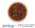 Coffee beans and ground coffee in wooden bowl isolated 77113137
