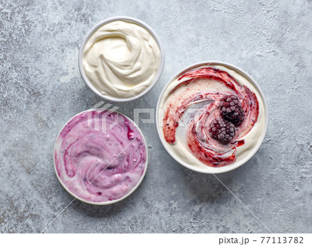 bowls of various yogurts 77113782