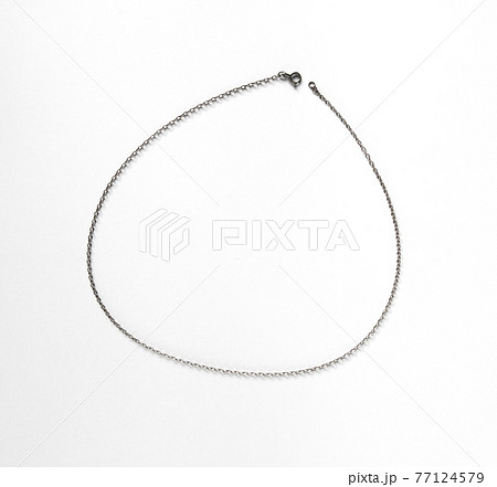 Silver chain necklace isolated on white background 77124579