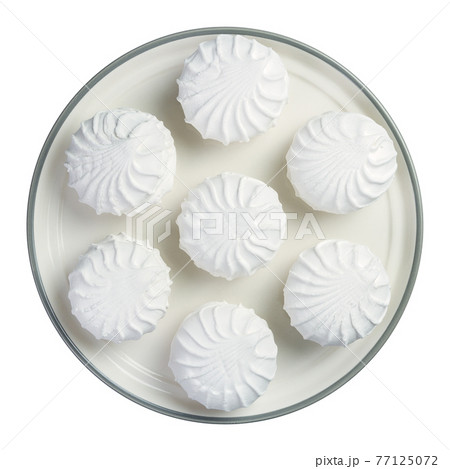 White marshmallow on a plate isolated on white White marshmallow on a plate isolated on white 77125072