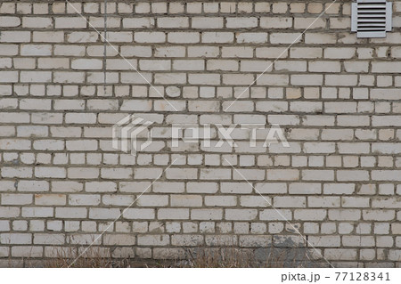 Old brick texture wall with ventilation grate. 77128341