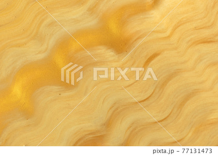 Abstract art background golden colors. Watercolor painting on canvas with yellow curly strokes. Acrylic artwork Abstract art background golden colors. Watercolor painting on canvas with yellow curly strokes. Acrylic artwork 77131473