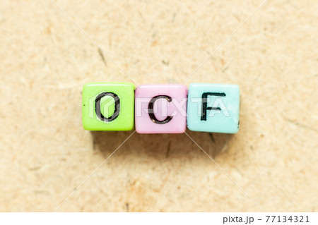 Color alphabet letter block in word OCF (Abbreviation of Operating cash flow) on wood background Color alphabet letter block in word OCF (Abbreviation of Operating cash flow) on wood background 77134321