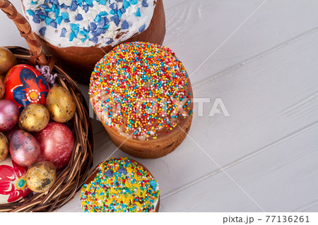 Top view easter cakes and eggs pile. Top view easter cakes and eggs pile. 77136261